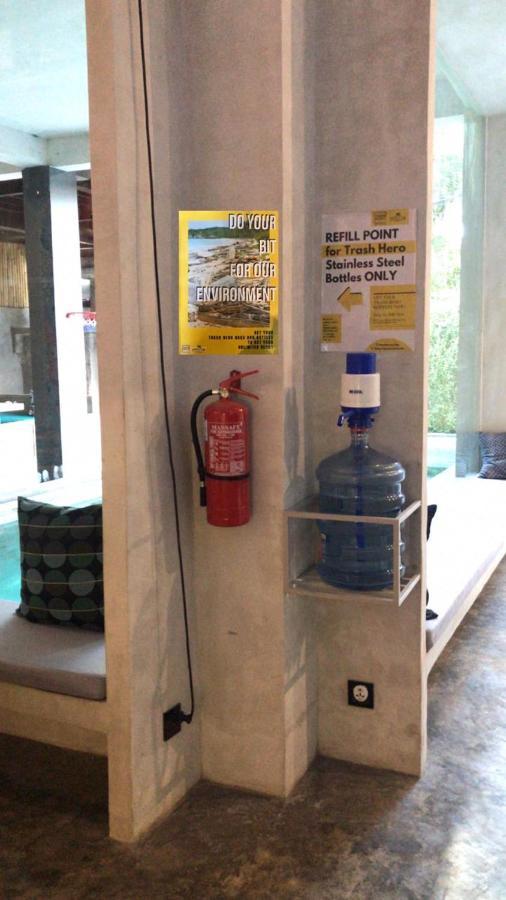 Stellar Capsules Hostel Seminyak  Ngoại thất bức ảnh A fire extinguisher in a public place